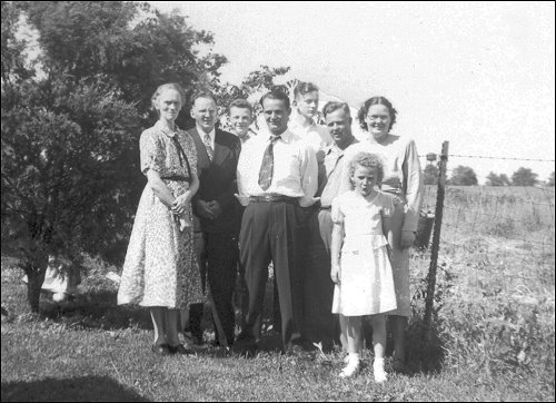 Mom, Dad, Don, Herschell (in front), Herb, Floyd, Naomi, and Beverly in front. 1947, in Muncie.