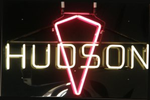 I assume this sign hangs in the former Hudson car dealership. My father had a 1938 Hudson, which was a beautiful car indeed. He also had some Terraplanes when I was too little to appreciate it, and an Essex which I barely remember; all were products of the Hudson Motor Car Company.